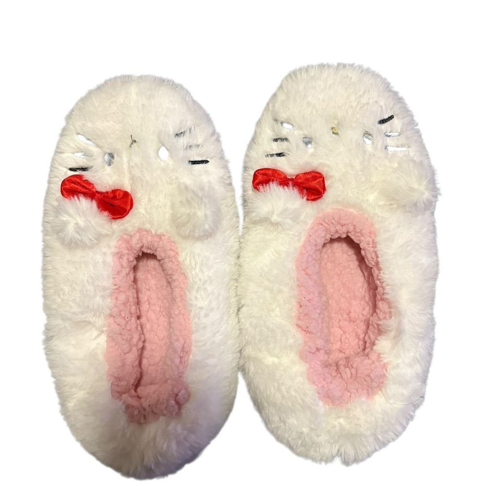 White and pink hello kitty slippers